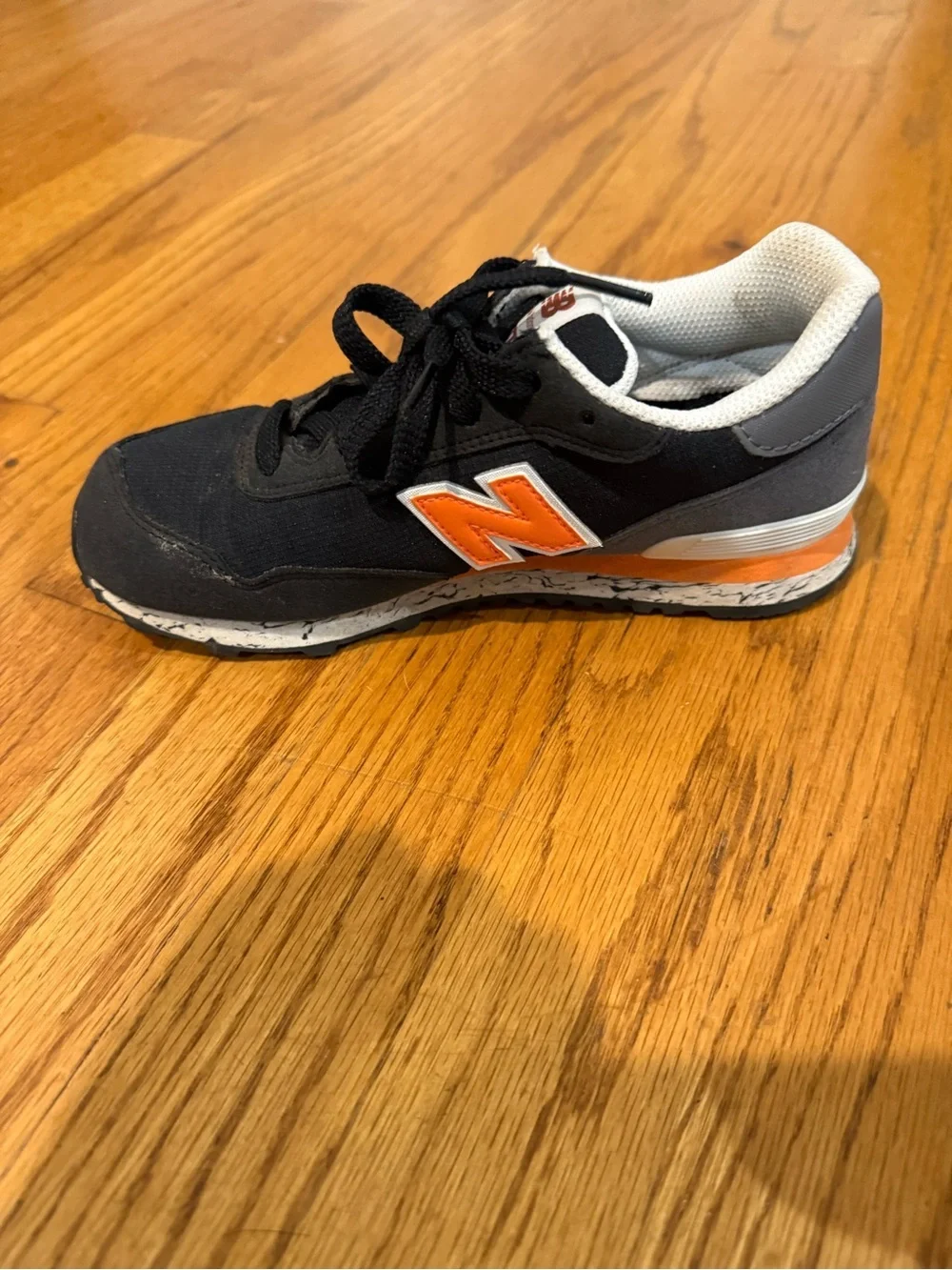 New Balance Kids Black and Orange Low-Top Sneakers